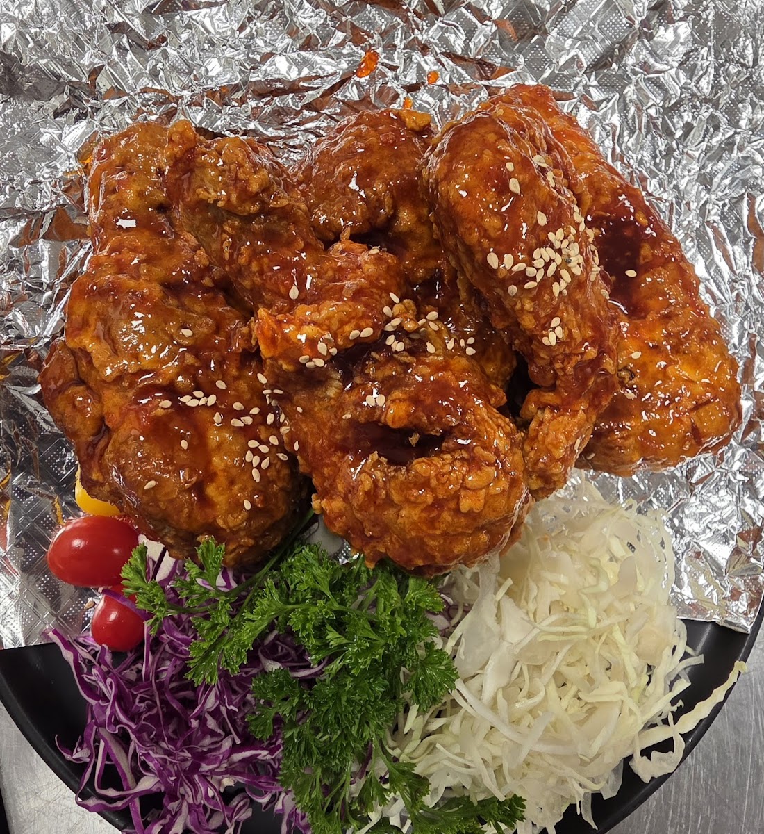 Tebasaki Nagoya-style fried chicken wings glazed in sweet-spicy signature sauce